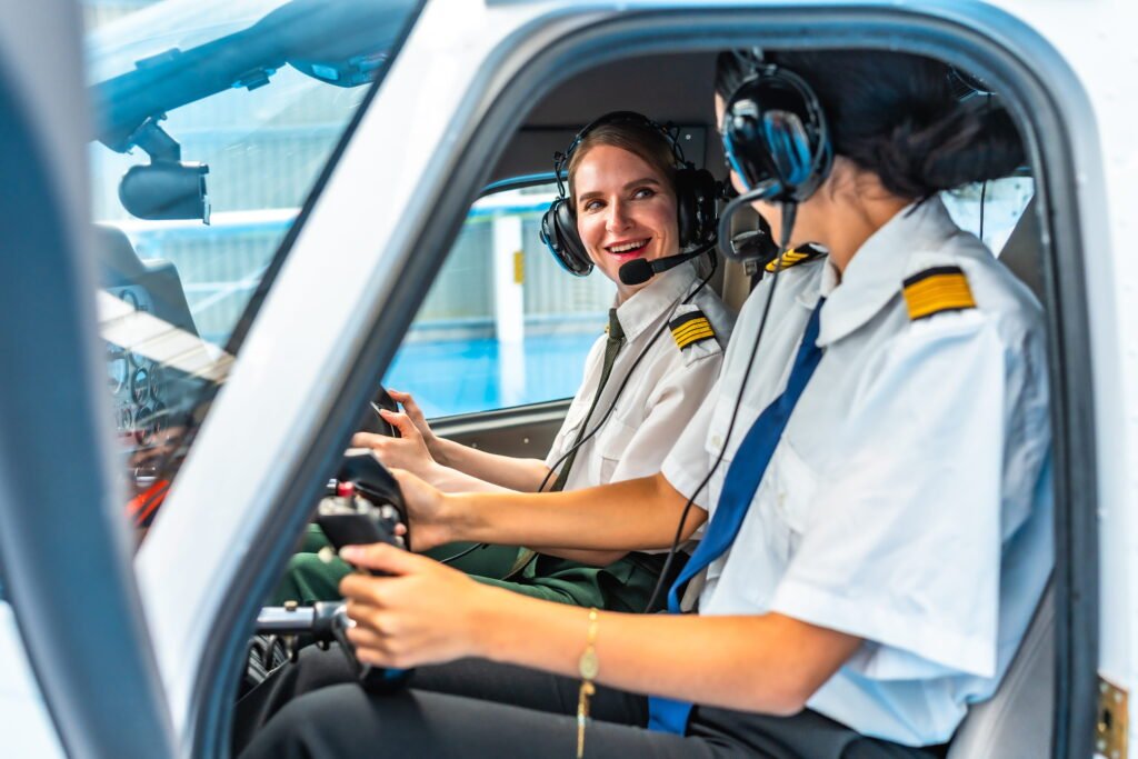 Female-pilots-in-cockpit-ready-for-takeoff-. Women in Aviation Recruitment